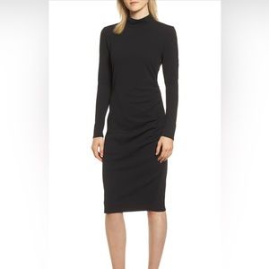 Body con dress with mock turtle neck and side gathering. Never worn